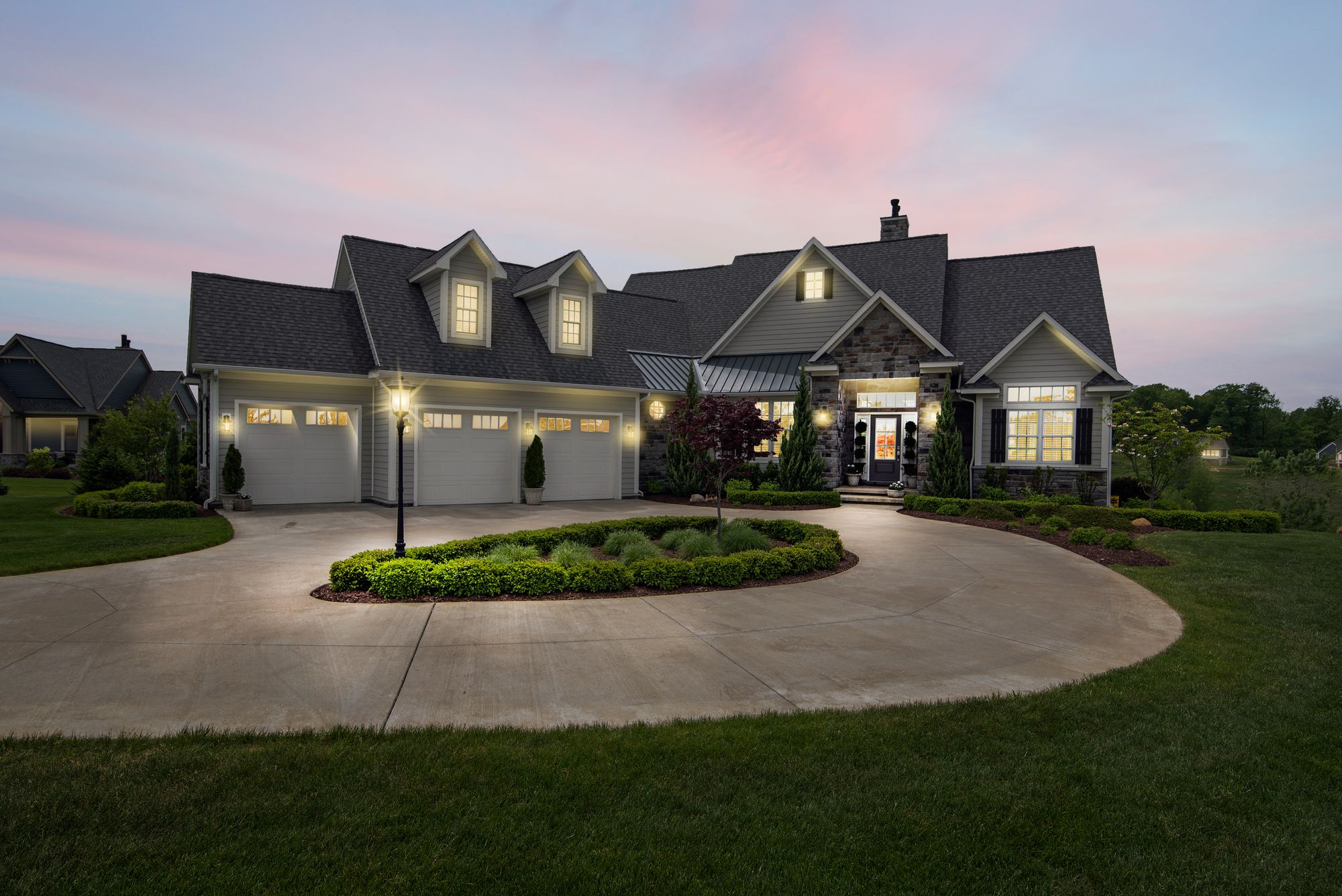 Home at dusk with a new roof